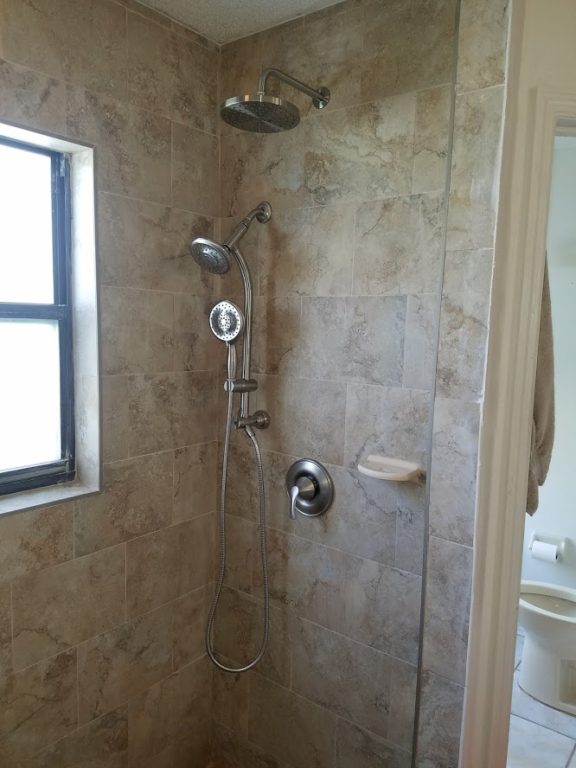new bathroom tile and dual shower body